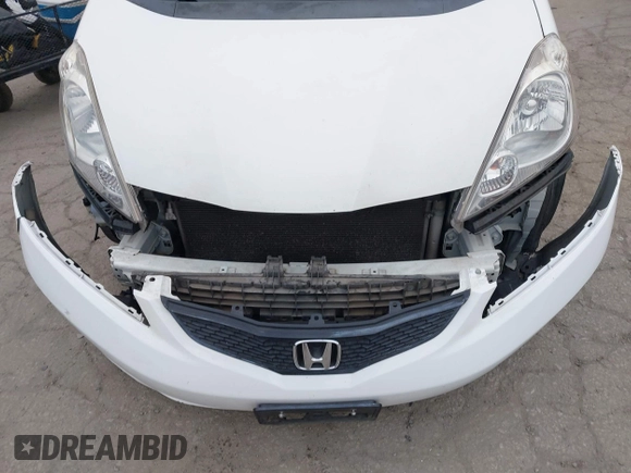 2009 Honda Fit Sport with VIN JHMGE88409S021730, listed as a IAAI auction lot 42045023 with 309,995 mi miles. Bid and sale history available at carsss.com. Image 17.