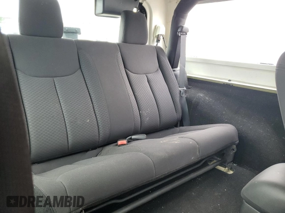 2013 Jeep Wrangler Sport z VIN 1C4AJWAG3DL574449, wystawiony jako Copart lot #58001535 z przebiegiem 35 533 mil mil oraz Szkoda całkowita • Salvage title. Historia ofert i sprzedaży dostępna na DreamBid. Obrazek 10.