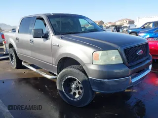 2004 Ford F-150 XLT with VIN 1FTRW12W54KC37557, listed as a IAAI auction lot 41503188 with 148,962 mi miles. Bid and sale history available at carsss.com. Image 1.