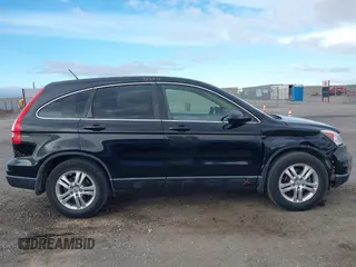 2011 Honda CR-V EX-L with VIN 5J6RE3H77BL021340, listed as a IAAI auction lot 41208898 with 153,096 mi miles. Bid and sale history available at carsss.com. Image 13.