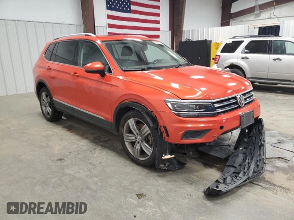 2019 Volkswagen Tiguan SEL Premium with VIN 3VV4B7AX6KM004524, listed as a Copart auction lot 50950915 with 77,563 mi miles and Salvage Title. Bid and sale history available at DreamBid. Image 4.