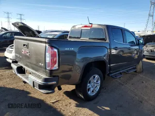 2019 GMC Canyon 4WD SLE with VIN 1GTG6CEN0K1266330, listed as a Copart auction lot 87117014 with 42,096 mi miles and Salvage Title. Bid and sale history available at carsss.com. Image 3.