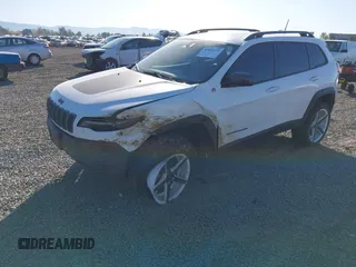 2021 Jeep Cherokee Trailhawk with VIN 1C4PJMBX9MD105888, listed as a IAAI auction lot 42065175 with 55,469 mi miles and . Bid and sale history available at DreamBid. Image 18.