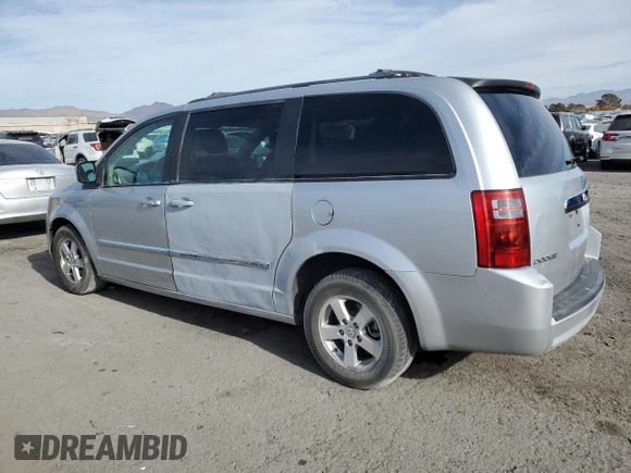 2009 Dodge Grand Caravan SXT z VIN 2D8HN54159R620187, wystawiony jako Copart lot #84703224 z przebiegiem 206 240 mil mil oraz Szkoda całkowita • Salvage title. Historia ofert i sprzedaży dostępna na DreamBid. Obrazek 2.