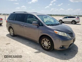 2015 Toyota Sienna XLE with VIN 5TDYK3DC4FS629558, listed as a Copart auction lot 64062045 with 172,669 mi miles and Clean title. Bid and sale history available at DreamBid. Image 4.