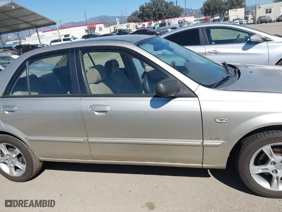 2003 Mazda Protege LX with VIN JM1BJ226330154838, listed as a IAAI auction lot 41854918 with NaN miles. Bid and sale history available at carsss.com. Image 13.
