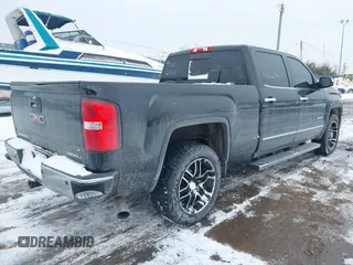 2014 GMC Sierra 1500 Denali z VIN 3GTU2WEC9EG310426, wystawiony jako IAAI lot #41616941 z przebiegiem 115 808 mil mil oraz . Historia ofert i sprzedaży dostępna na DreamBid. Obrazek 4.