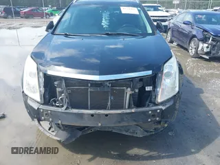 2014 Cadillac SRX Performance Collection с VIN 3GYFNFE38ES656510, выставлен на аукционе IAAI как лот 42336472 с пробегом 125 269 миль миль и . История ставок и продаж доступна на DreamBid. Изображение 12.