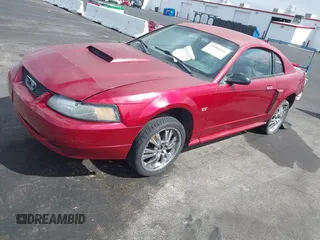 2003 Ford Mustang GT Deluxe with VIN 1FAFP42X43F363173, listed as a IAAI auction lot 42086161 with 103,828 mi miles. Bid and sale history available at carsss.com. Image 2.