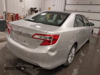 2014 Toyota Camry L with VIN 4T4BF1FK4ER412428, listed as a IAAI auction lot 41573095 with 130,000 mi miles. Bid and sale history available at carsss.com. Image 4.