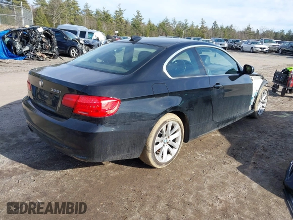 2011 BMW 3 Series 328i xDrive with VIN WBAKF5C52BE655212, listed as a IAAI auction lot 41802186 with 185,014 mi miles. Bid and sale history available at carsss.com. Image 4.