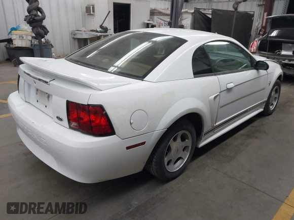2000 Ford Mustang z VIN 1FAFP4043YF159108, wystawiony jako IAAI lot #41885338 z przebiegiem 286 158 mil mil oraz . Historia ofert i sprzedaży dostępna na DreamBid. Obrazek 4.