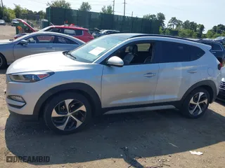 2018 Hyundai Tucson Value with VIN KM8J3CA26JU697712, listed as a IAAI auction lot 40323457 with 53,175 mi miles. Bid and sale history available at carsss.com. Image 14.