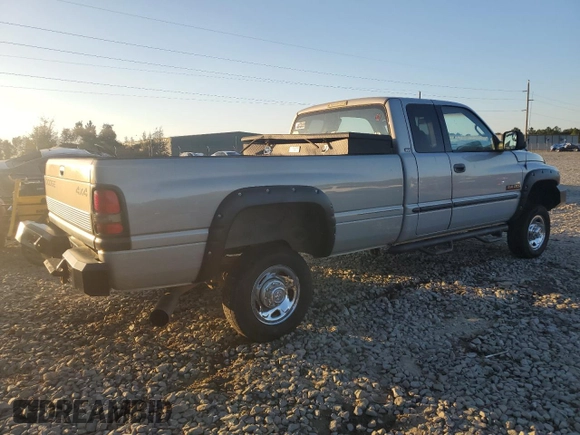 1999 Dodge Ram 2500 with VIN 1B7KF2367XJ615880, listed as a Copart auction lot 76781554 with 318,125 mi miles and Salvage Title. Bid and sale history available at carsss.com. Image 3.