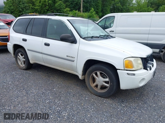 2006 GMC Envoy SLE z VIN 1GKDT13S562116159, wystawiony jako IAAI lot #42361666 z przebiegiem 243 466 mil mil oraz . Historia ofert i sprzedaży dostępna na DreamBid. Obrazek 1.