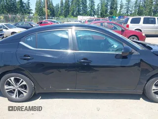 2022 Nissan Sentra SV z VIN 3N1AB8CV0NY256613, wystawiony jako IAAI lot #42440347 z przebiegiem 65 030 mil mil oraz . Historia ofert i sprzedaży dostępna na DreamBid. Obrazek 14.