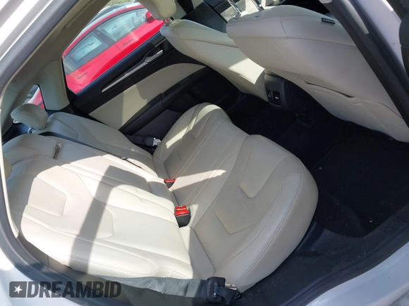 2017 Ford Fusion Hybrid Titanium с VIN 3FA6P0RU7HR148191, выставлен на аукционе IAAI как лот 42167708 с пробегом 72 708 миль миль и . История ставок и продаж доступна на DreamBid. Изображение 8.