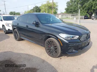 2023 BMW X6 xDrive40i z VIN 5UXCY6C06P9P01571, wystawiony jako IAAI lot #42066294 z przebiegiem 41 755 mil mil oraz . Historia ofert i sprzedaży dostępna na DreamBid. Obrazek 1.