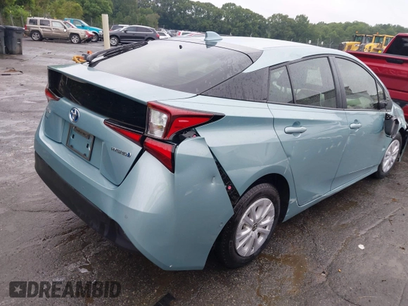 2022 Toyota Prius L Eco with VIN JTDKAMFU4N3158998, listed as a IAAI auction lot 42625041 with 43,033 mi miles and . Bid and sale history available at DreamBid. Image 4.