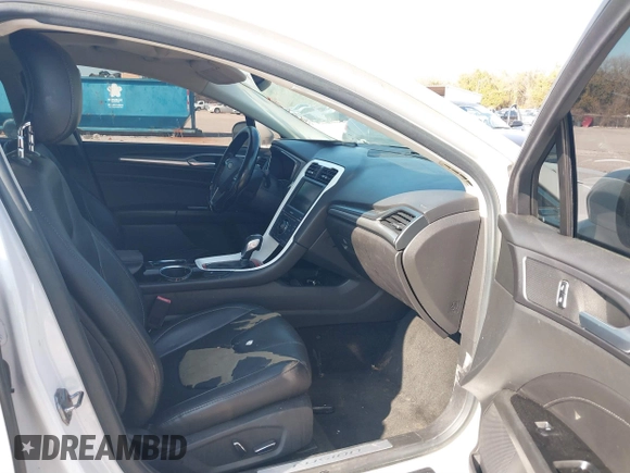 2013 Ford Fusion Titanium Hybrid with VIN 3FA6P0RU3DR343179, listed as a IAAI auction lot 41488267 with 268,872 mi miles. Bid and sale history available at carsss.com. Image 5.