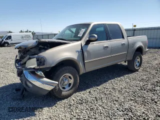 2001 Ford F-150 XLT with VIN 1FTRW08WX1KB37418, listed as a Copart auction lot 60573435 with 135,131 mi miles and Salvage title. Bid and sale history available at DreamBid. Image 1.