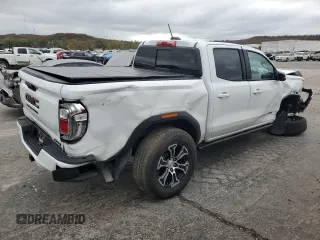 2023 GMC Canyon 4WD AT4 with VIN 1GTP6DEK5P1215120, listed as a Copart auction lot 79029374 with 16,520 mi miles and Salvage Title. Bid and sale history available at carsss.com. Image 3.