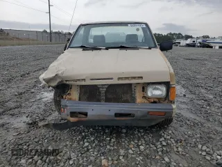 1986 Nissan Hardbody E z VIN JN6ND11S7GW014787, wystawiony jako Copart lot #45291425 z przebiegiem 171 557 mil mil oraz Szkody całkowita. Historia ofert i sprzedaży dostępna na DreamBid. Obrazek 5.