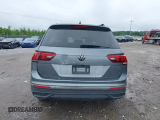 2022 Volkswagen Tiguan S with VIN 3VV1B7AX9NM005125, listed as a IAAI auction lot 42371110 with 94,060 mi miles and . Bid and sale history available at DreamBid. Image 16.