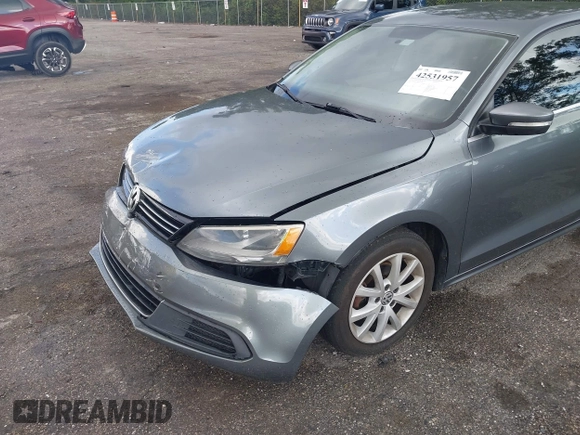 2014 Volkswagen Jetta SE with VIN 3VWD07AJ9EM277085, listed as a IAAI auction lot 42531957 with 171,613 mi miles and . Bid and sale history available at DreamBid. Image 6.