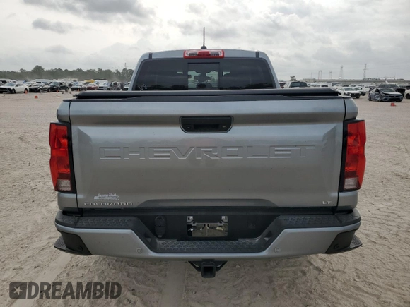 2023 Chevrolet Colorado 4WD LT z VIN 1GCPTCEK2P1208273, wystawiony jako Copart lot #53831945 z przebiegiem 19 113 mil mil oraz Szkody całkowita. Historia ofert i sprzedaży dostępna na DreamBid. Obrazek 6.
