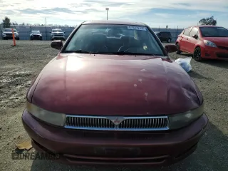 2000 Mitsubishi Galant ES with VIN 4A3AA46GXYE054866, listed as a Copart auction lot 87023214 with 120,337 mi miles and Salvage Title. Bid and sale history available at carsss.com. Image 5.