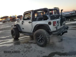 2007 Jeep Wrangler X with VIN 1J4FA24137L107083, listed as a Copart auction lot 88334565 with 156,689 mi miles and Salvage Title. Bid and sale history available at carsss.com. Image 2.
