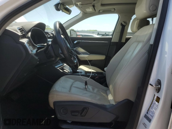 2020 Audi Q3 Premium with VIN WA1AECF32L1031641, listed as a Copart auction lot 60266275 with 43,730 mi miles and Salvage title. Bid and sale history available at DreamBid. Image 7.