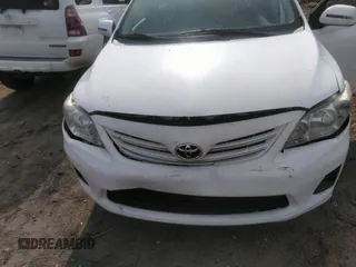 2013 Toyota Corolla L with VIN 2T1BU4EE0DC121177, listed as a IAAI auction lot 41759228 with 129,289 mi miles. Bid and sale history available at carsss.com. Image 6.