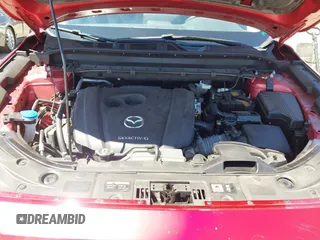 2021 Mazda CX-5 Grand Touring with VIN JM3KFADM5M0470483, listed as a IAAI auction lot 42785031 with 30,749 mi miles and . Bid and sale history available at DreamBid. Image 10.