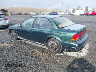 1997 Saturn SL with VIN 1G8ZK5276VZ329694, listed as a IAAI auction lot 41792109 with 208,002 mi miles and . Bid and sale history available at DreamBid. Image 3.