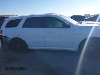 2021 Dodge Durango R/T with VIN 1C4SDJCT4MC663939, listed as a IAAI auction lot 40950558 with 52,054 mi miles and . Bid and sale history available at DreamBid. Image 13.