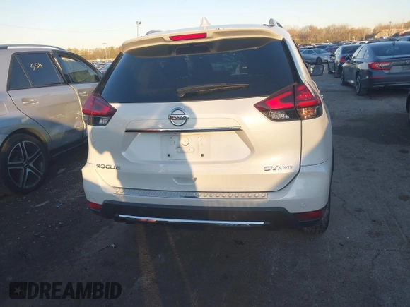 2019 Nissan Rogue SL with VIN 5N1AT2MV0KC841763, listed as a IAAI auction lot 40810670 with 54,315 mi miles and . Bid and sale history available at carsss.com. Image 16.