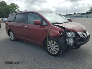 2011 Toyota Sienna XLE with VIN 5TDDK3DCXBS024257, listed as a Copart auction lot 60667145 with 283,609 mi miles and Salvage title. Bid and sale history available at DreamBid. Image 4.