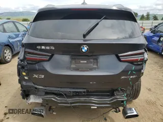 2022 BMW X3 xDrive30i with VIN 5UX53DP02N9J49988, listed as a Copart auction lot 52030915 with 32,916 mi miles and Salvage Title. Bid and sale history available at DreamBid. Image 6.