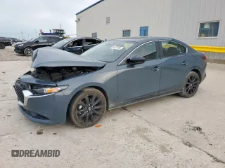2024 Mazda 3 S Carbon Edition с VIN 3MZBPBCM0RM411159, выставлен на аукционе Copart как лот 63127795 с пробегом 35 318 миль миль и Списание • Salvage title. История ставок и продаж доступна на DreamBid. Изображение 1.