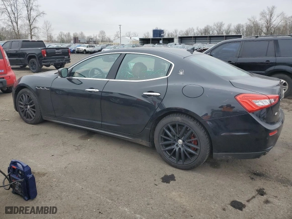 2014 Maserati Ghibli S Q4 with VIN ZAM57RTA3E1089652, listed as a Copart auction lot 42714205 with 89,346 mi miles and Salvage Title. Bid and sale history available at carsss.com. Image 2.