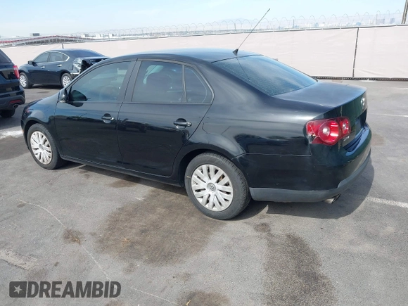 2010 Volkswagen Jetta S z VIN 3VWJZ7AJ9AM079352, wystawiony jako IAAI lot #42360317 z przebiegiem 160 813 mil mil oraz . Historia ofert i sprzedaży dostępna na DreamBid. Obrazek 3.