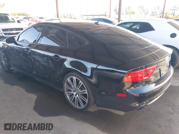 2015 Audi A7 Prestige with VIN WAU2GAFC2FN029875, listed as a IAAI auction lot 42032648 with 116,588 mi miles and . Bid and sale history available at DreamBid. Image 3.
