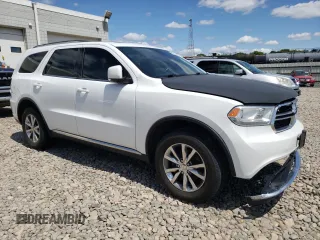 2014 Dodge Durango Limited with VIN 1C4RDJDG4EC563146, listed as a Copart auction lot 51373545 with 132,636 mi miles and Salvage title. Bid and sale history available at DreamBid. Image 4.