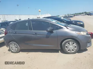 2016 Honda Fit LX z VIN JHMGK5H56GX041075, wystawiony jako IAAI lot #42023299 z przebiegiem 145 658 mil mil oraz . Historia ofert i sprzedaży dostępna na DreamBid. Obrazek 13.