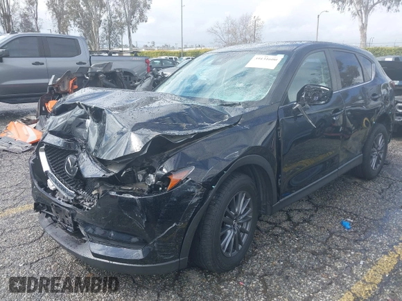 2021 Mazda CX-5 Sport with VIN JM3KFABM1M0356760, listed as a IAAI auction lot 39131600 with 1 mi miles. Bid and sale history available at carsss.com. Image 16.