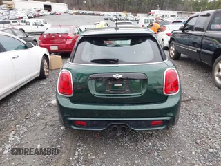 2016 MINI Cooper Hardtop 4 Door S with VIN WMWXU3C58G2D31595, listed as a IAAI auction lot 41267547 with 145,191 mi miles. Bid and sale history available at carsss.com. Image 16.