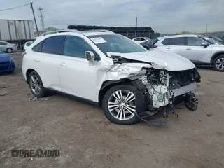 2015 Lexus RX 450h with VIN 2T2BC1BA7FC001586, listed as a IAAI auction lot 42077169 with 83,640 mi miles and . Bid and sale history available at DreamBid. Image 1.