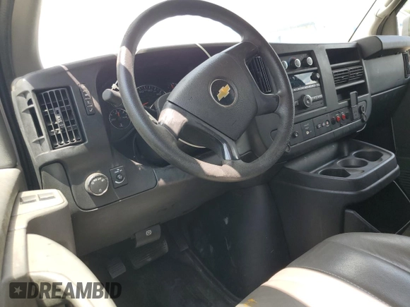 2015 Chevrolet Express Cargo z VIN 1GCWGFCF4F1230815, wystawiony jako Copart lot #60942305 z przebiegiem 185 018 mil mil oraz Czysty tytuł • Clean title. Historia ofert i sprzedaży dostępna na DreamBid. Obrazek 8.